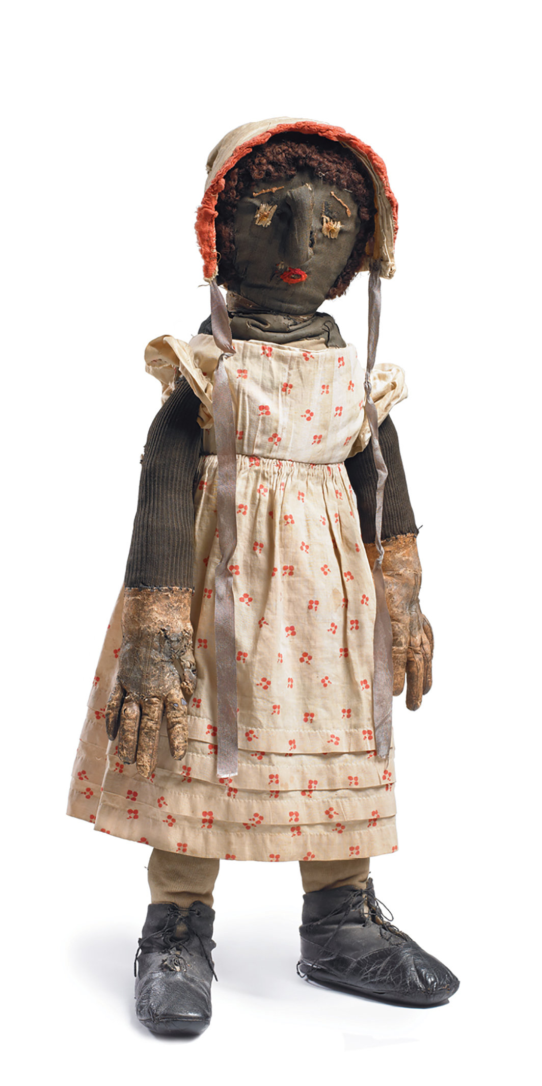女性玩偶，19世纪末，织物、皮革，24 × 10 × 6".